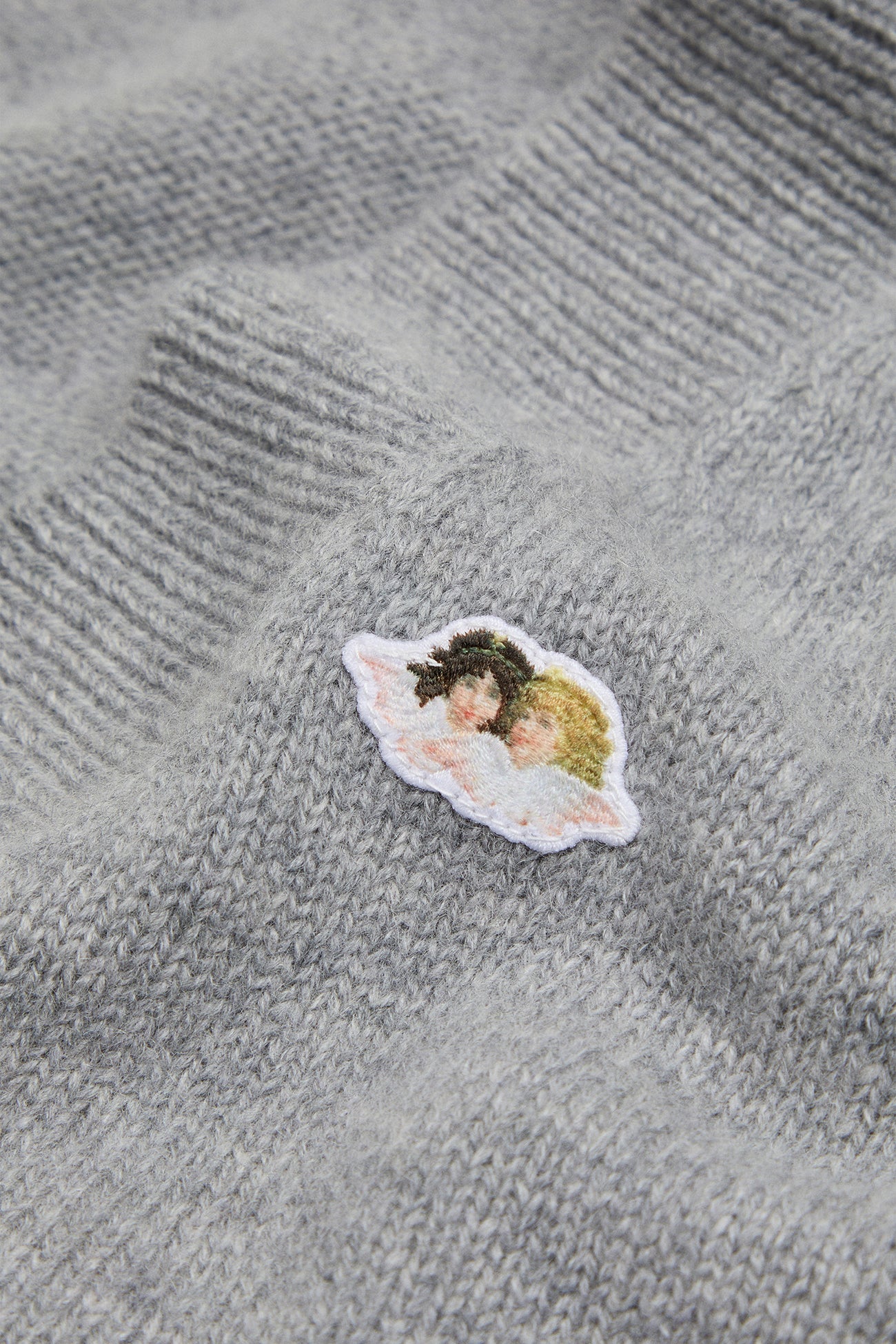 Maglione a V Patch Angeli